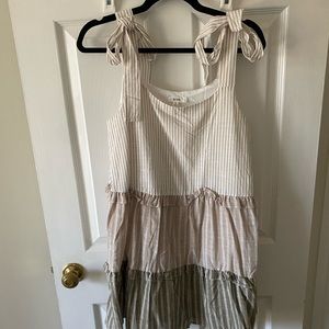 Off white, tan, and brown striped dress. Never worn. Like new condition. Small
